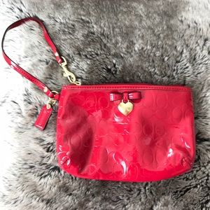 Patent leather coach wristlet